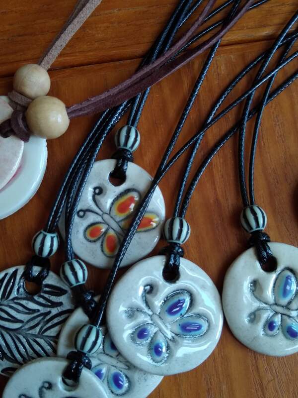 Handmade ceramic necklaces $30
